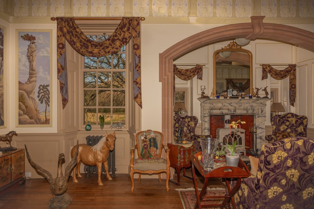 Stone chimneypiece and overmantel mirror
